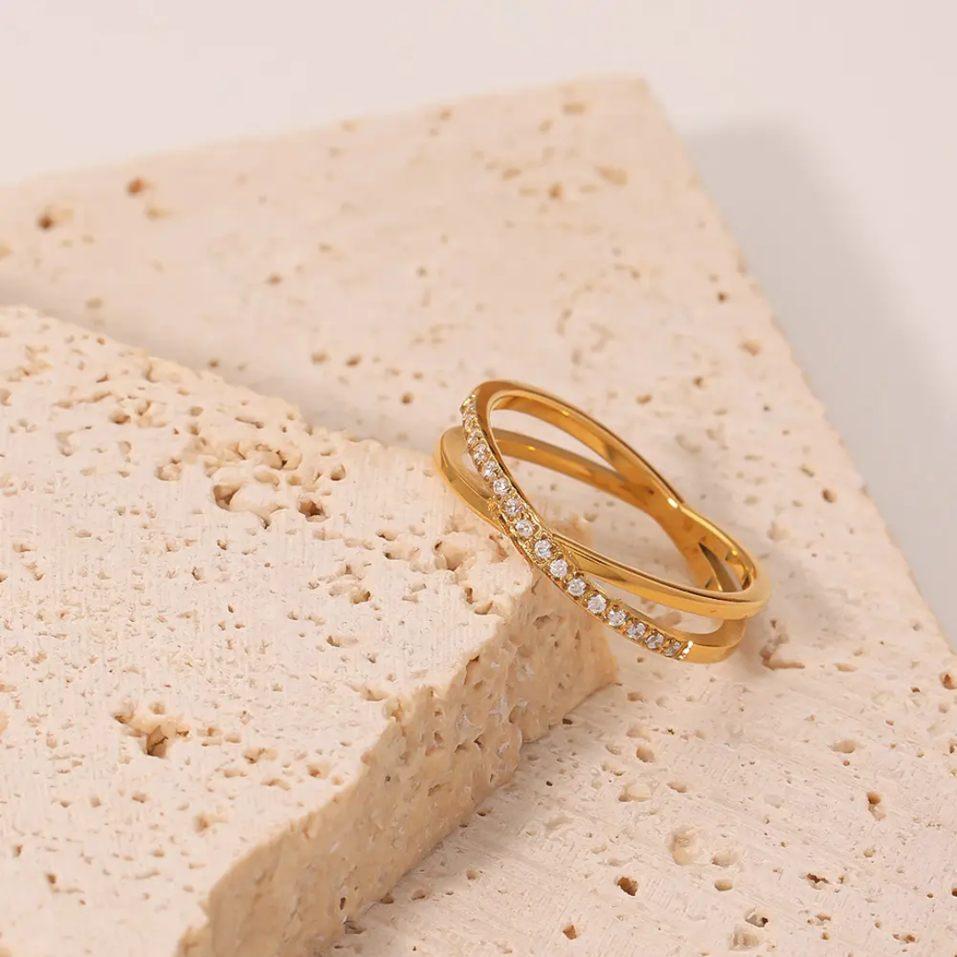 Elegant Criss-Cross Gold Plated Finger Ring with CZ Stones
