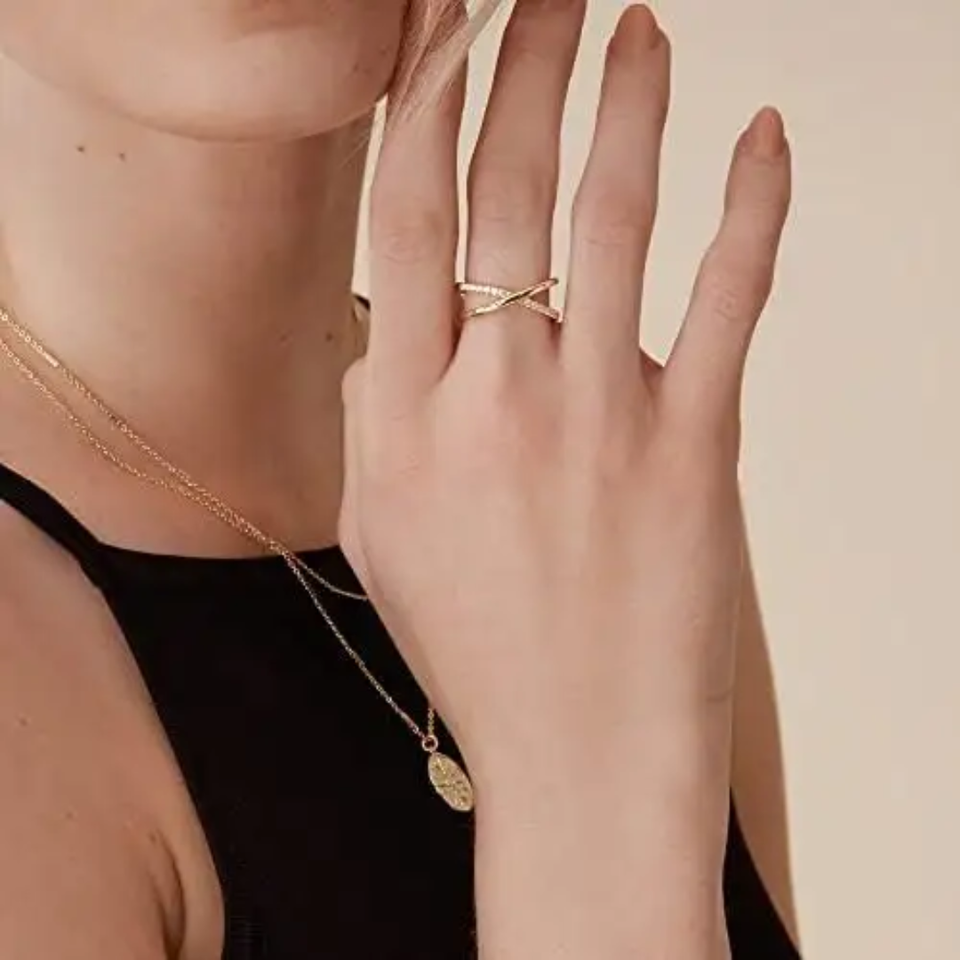 Stylish Crisscross Gold Plated Finger Ring with Sparkling Accents
